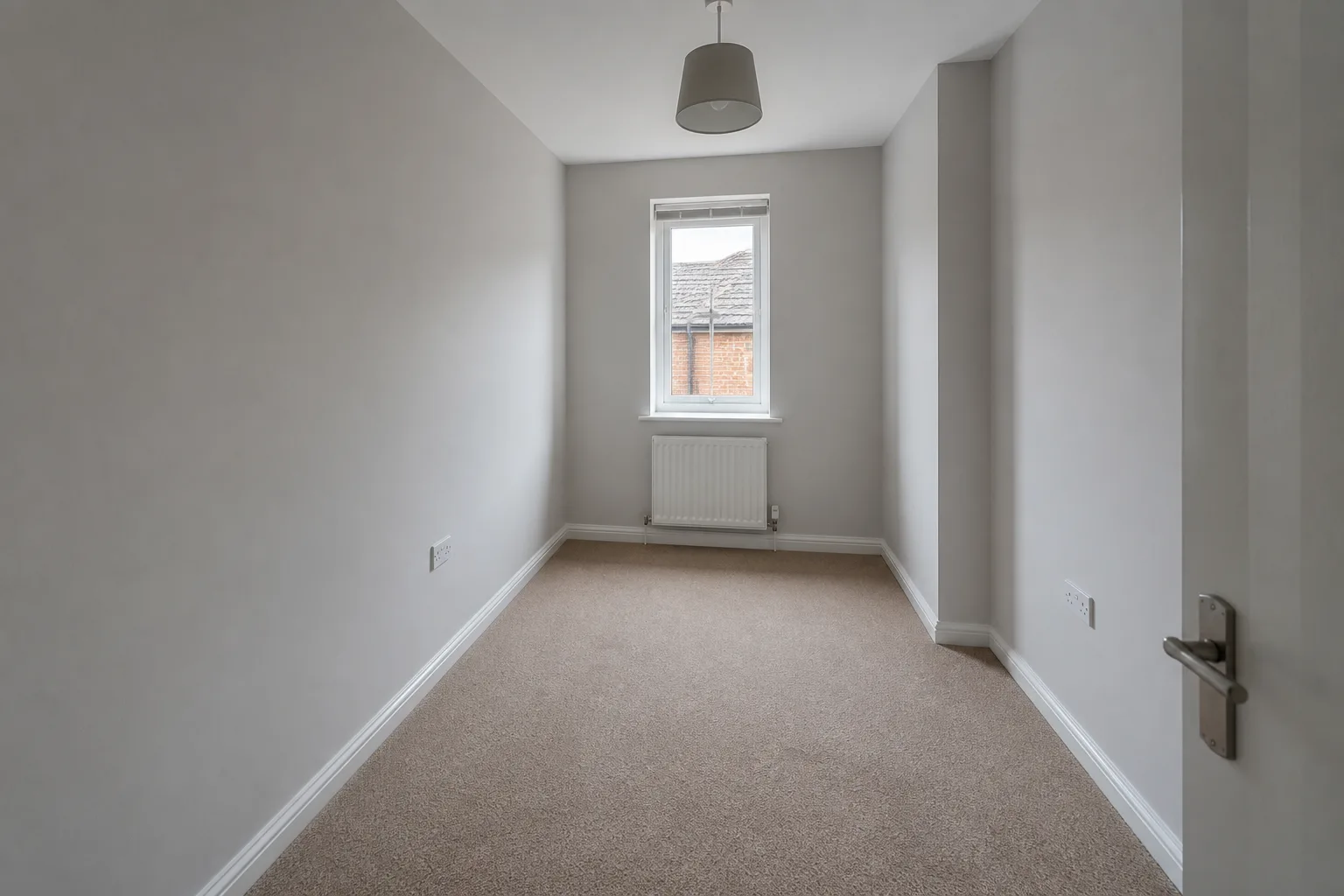 Narrow spare room before virtual staging
